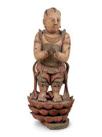 A Chinese Carved Wood Standing Figure with Polychrome Decoration