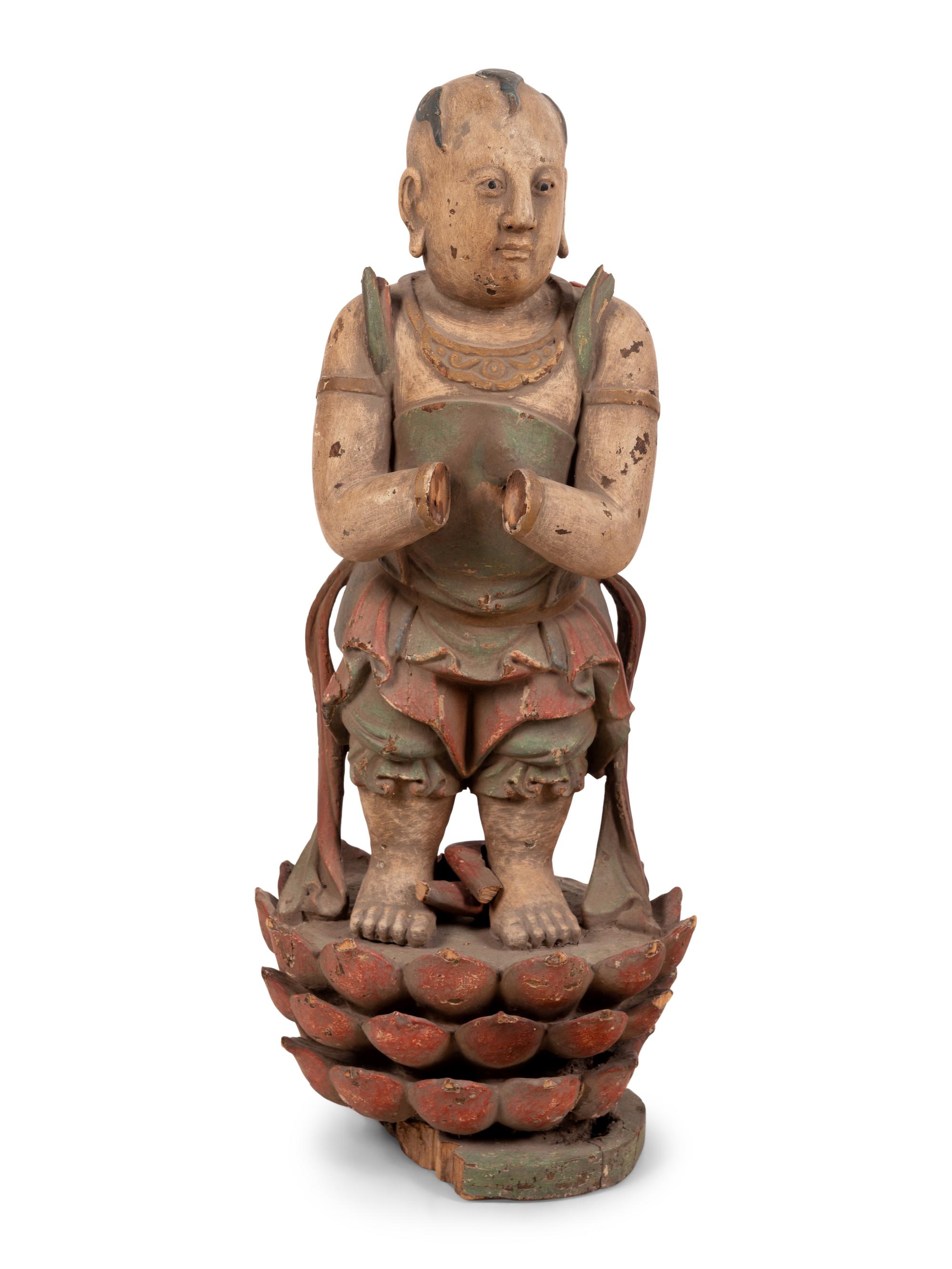 A Chinese Carved Wood Standing Figure with Polychrome Decoration