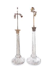 A Near Pair of Baccarat Cut Glass and Silvered Metal Mounted Lamps