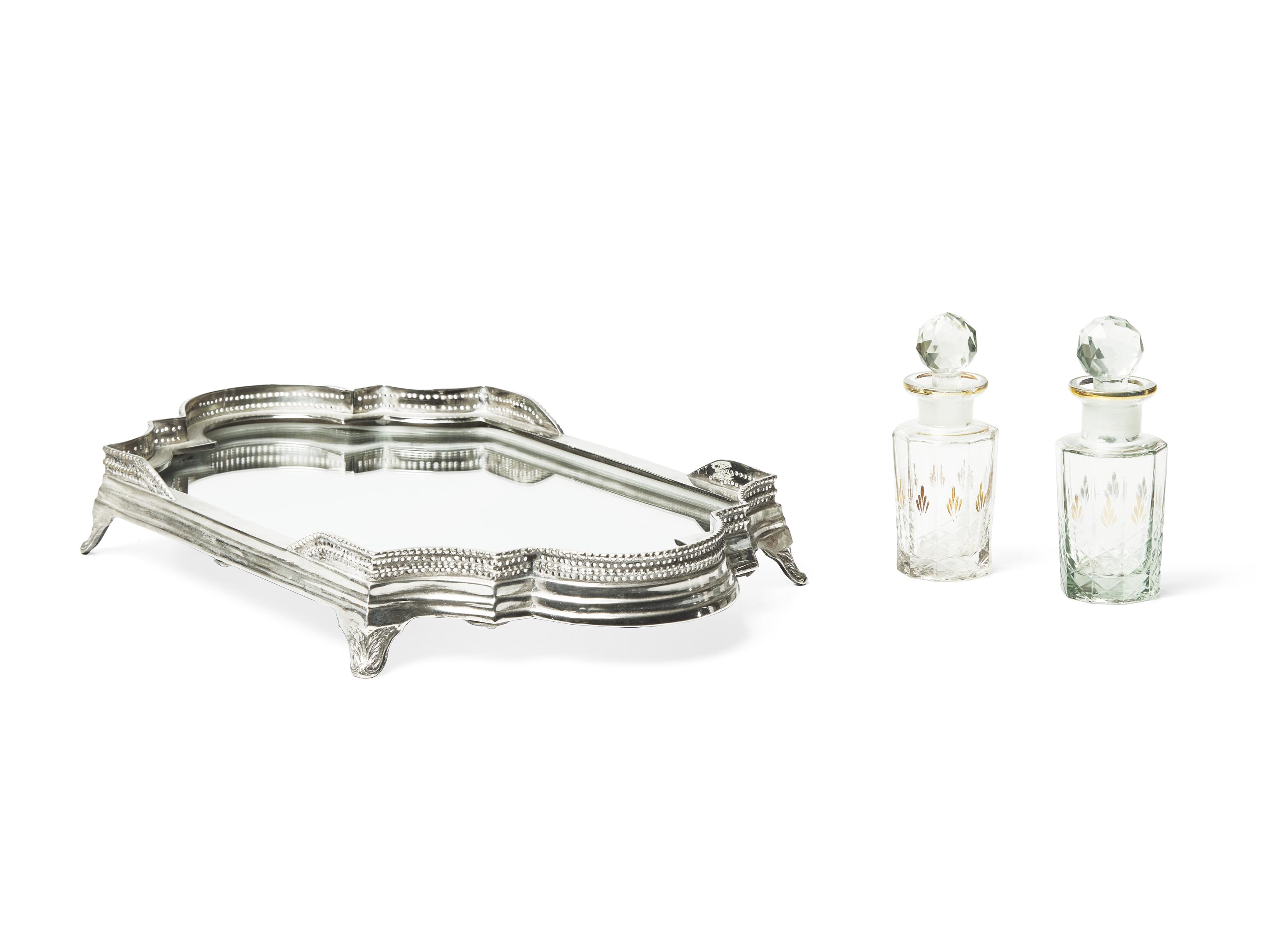 A Silver-Plate Table Plateau and a Pair of Cut Glass Decanters