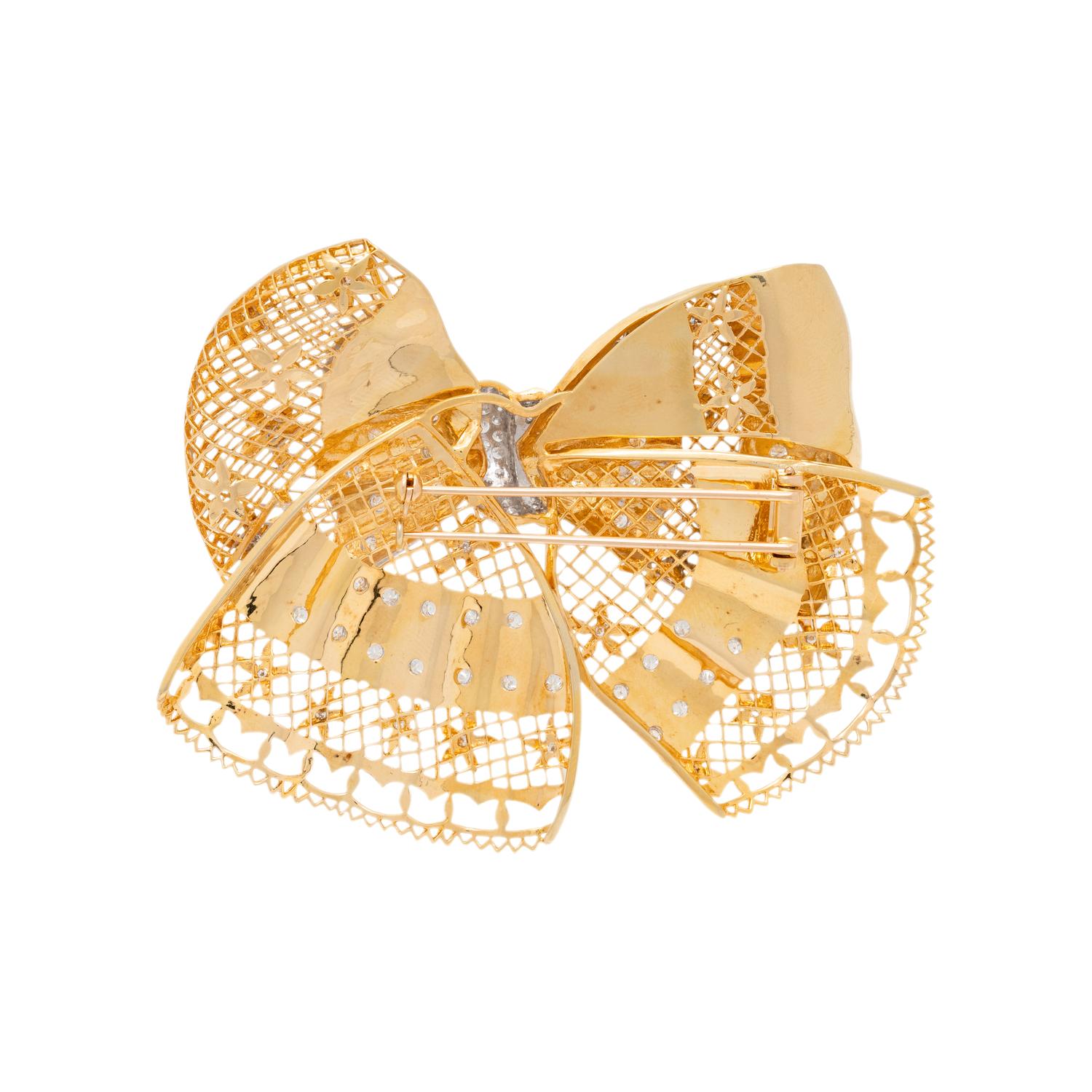 BICOLOR GOLD AND DIAMOND BOW BROOCH