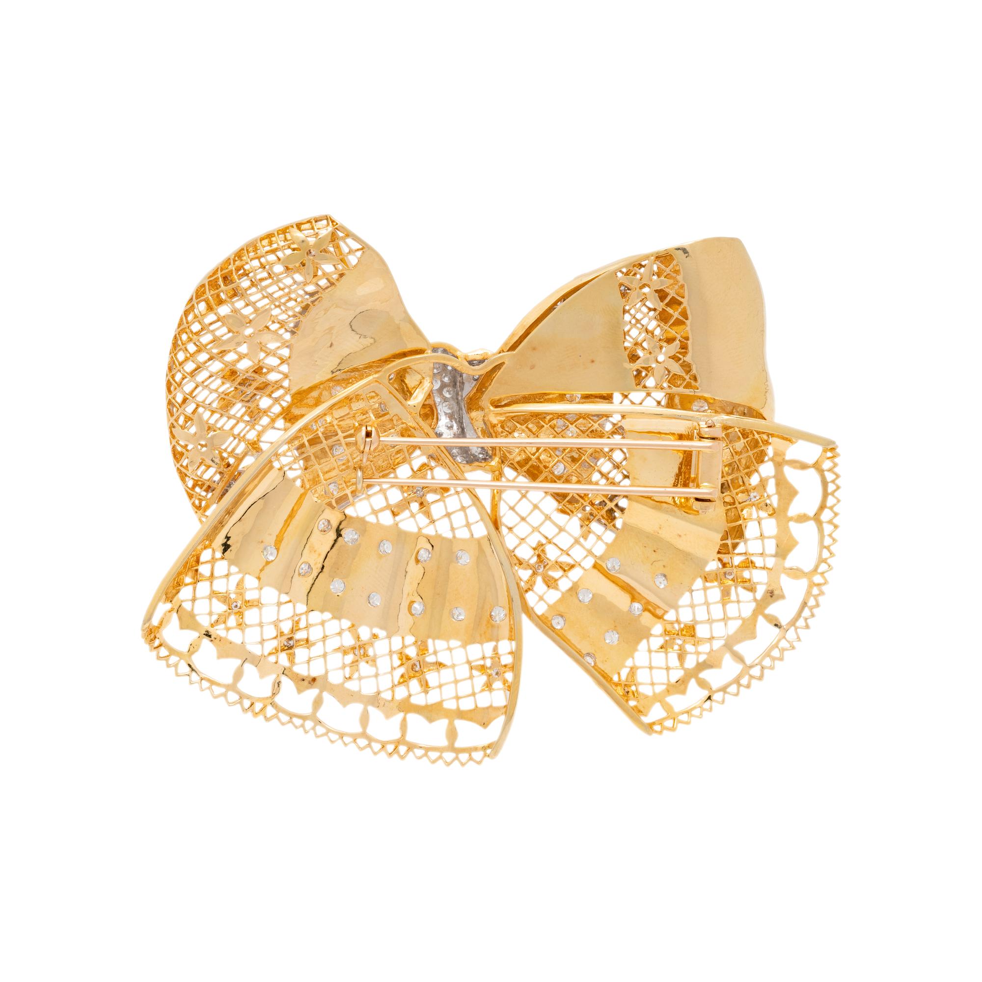 BICOLOR GOLD AND DIAMOND BOW BROOCH