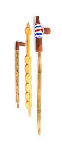 Two Plains Stone Clubs Length of longest 17 1/2 inches.