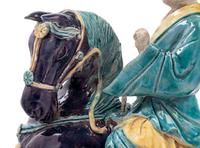 A Chinese Purple, Yellow and Blue Glazed Porcelain Equestrian Figure