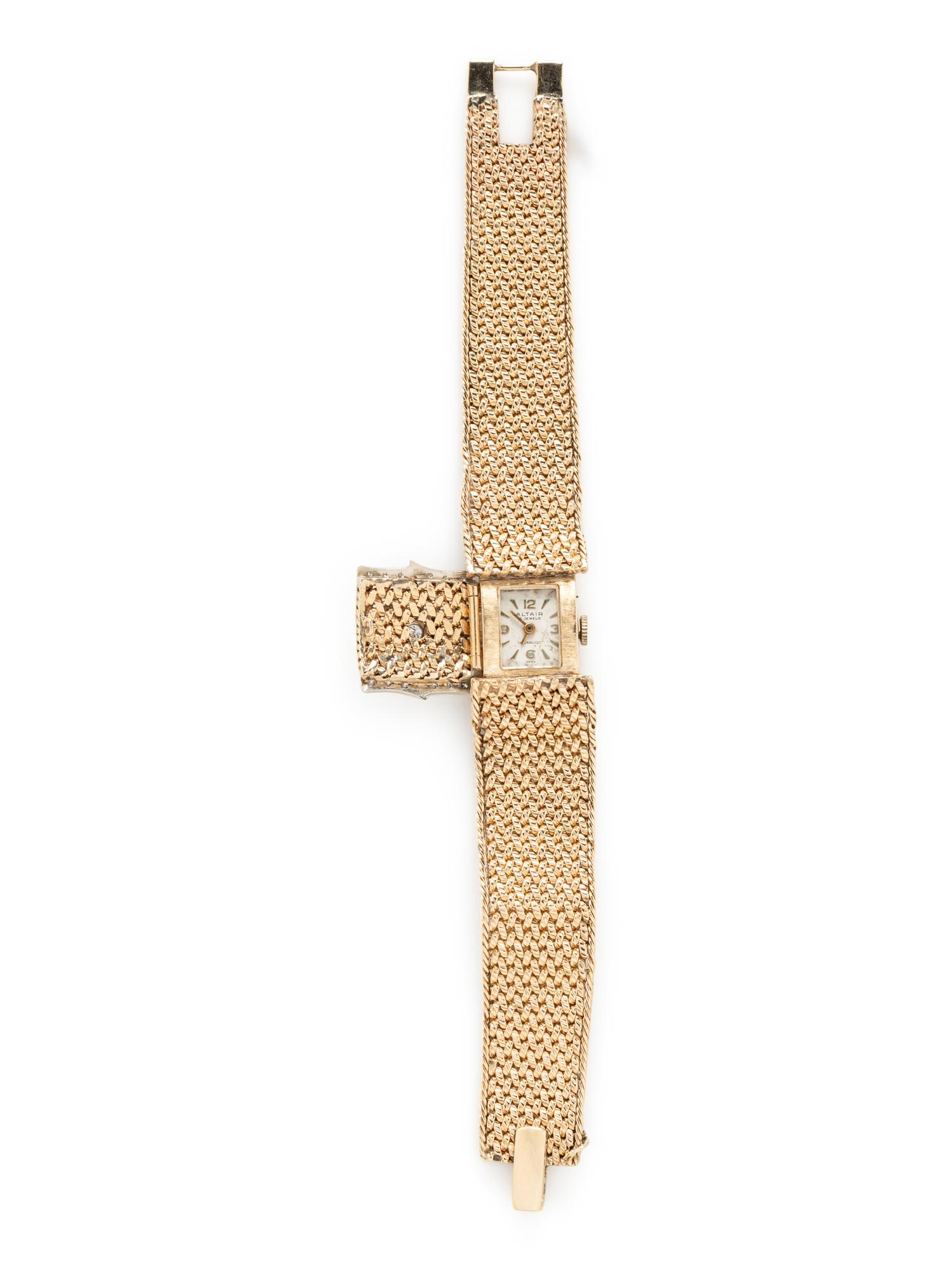 ALTAIR, YELLOW GOLD AND DIAMOND SURPRISE WATCH