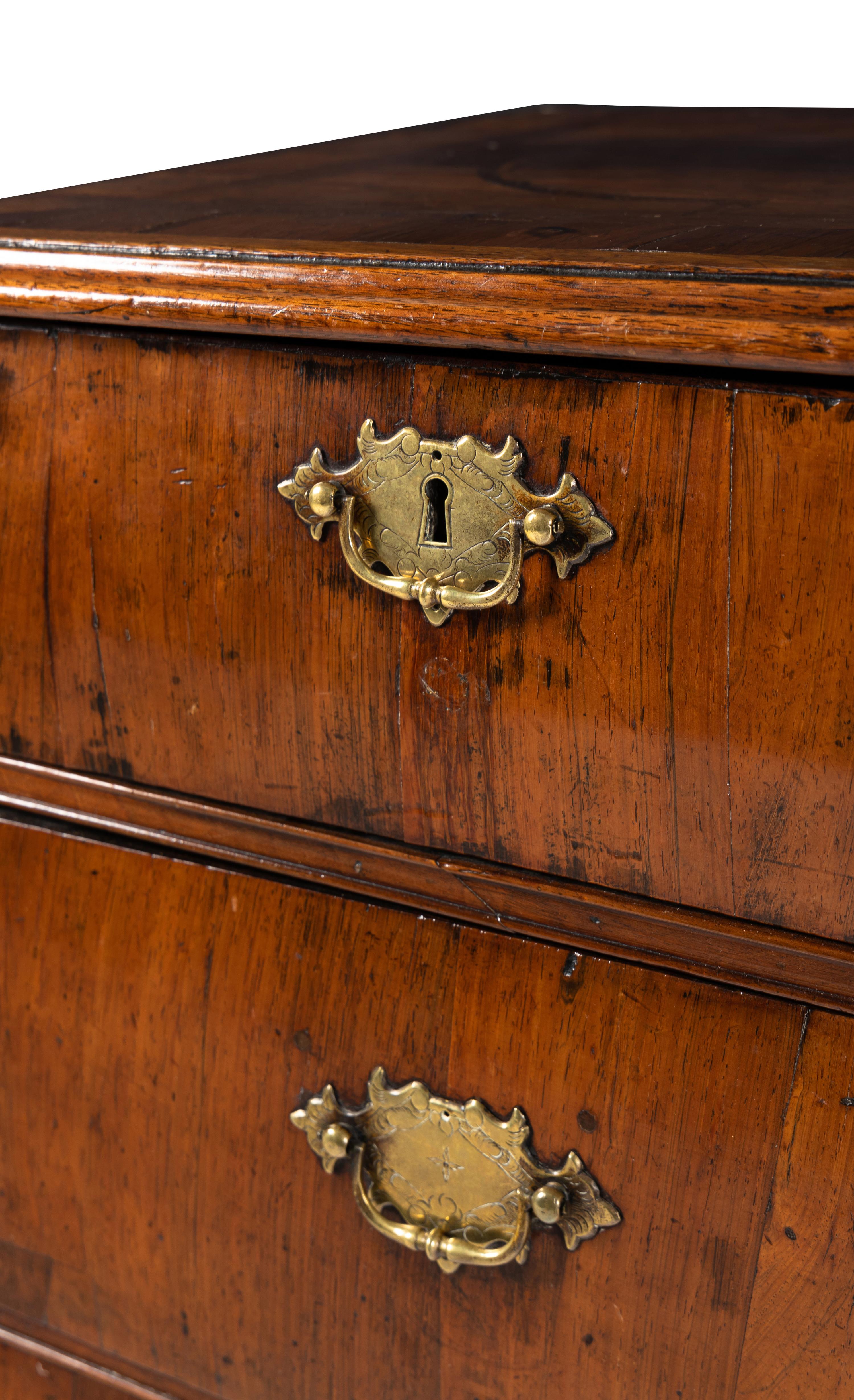 A George II Walnut and Marquetry Chest of Drawers