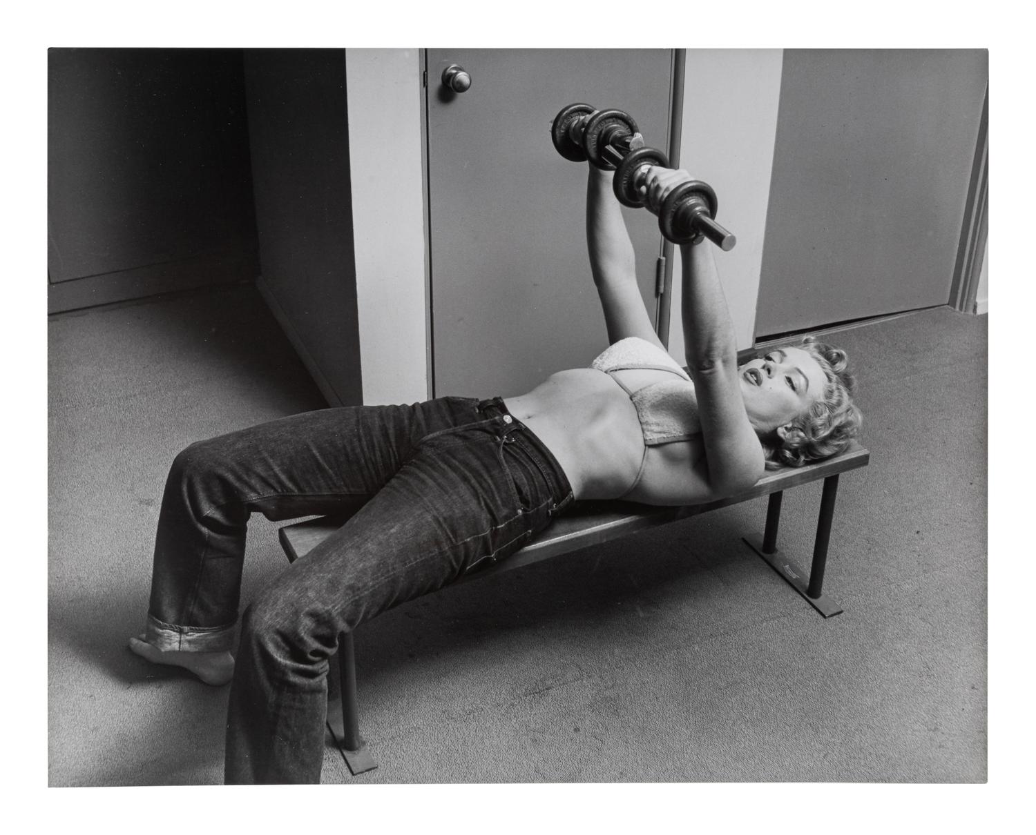 Philippe Halsman (1906-1979) Marilyn Monroe Lifting Weights, 1952