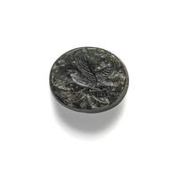 A Greco-Persian Onyx Scaraboid with a Griffin and Winged Sun Disc