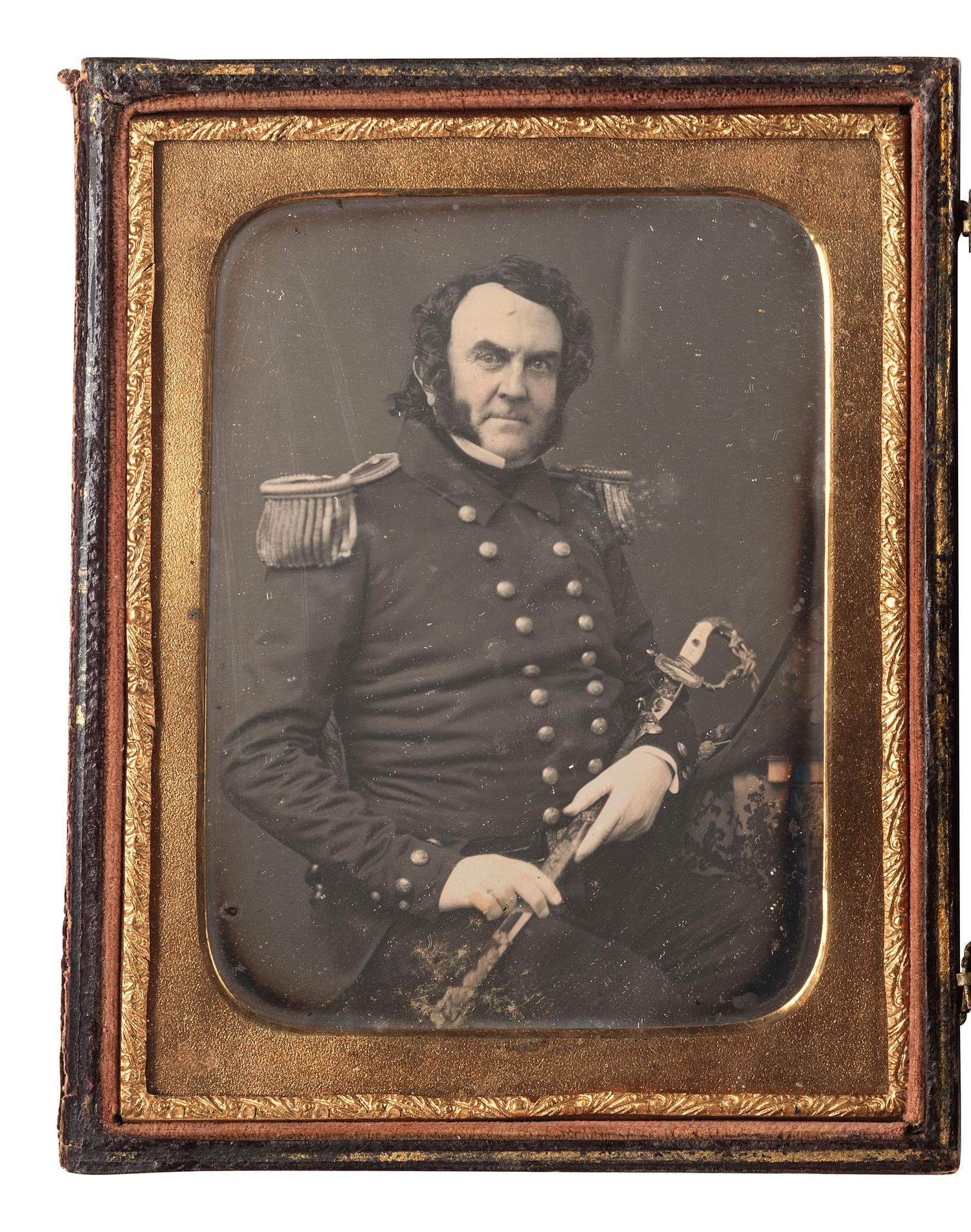 [MEXICAN WAR]. Quarter plate daguerreotype portrait of Thompson Darrah Shaw, USN, with sword presented to him for gallantry at Veracruz, 1847.