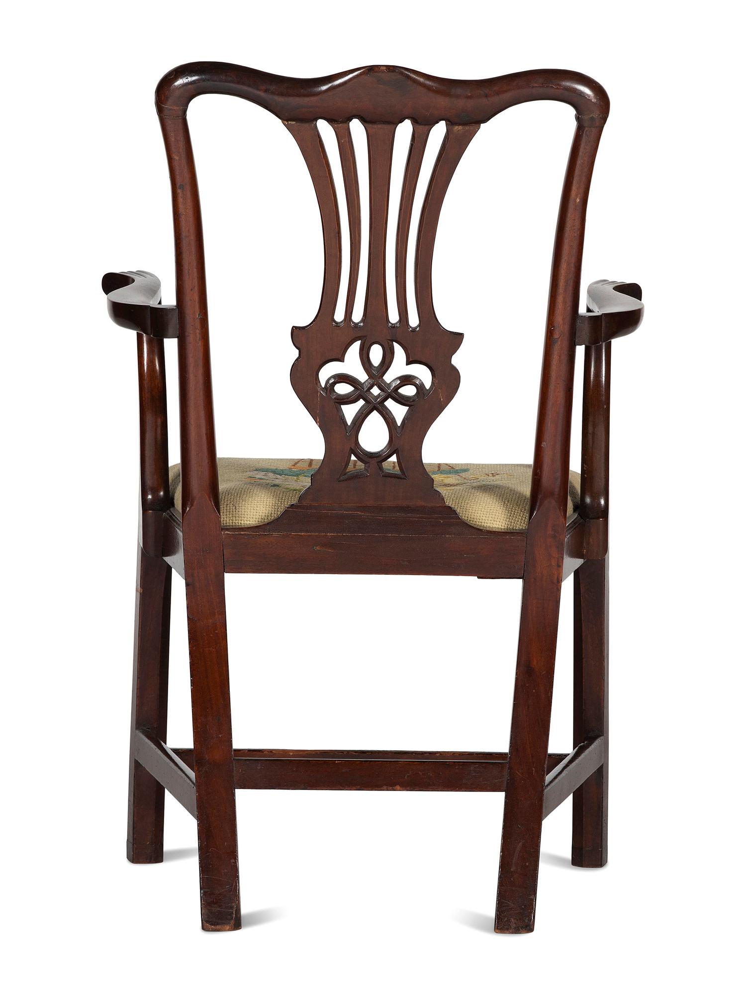 A Chippendale Carved and Figured Mahogany Armchair