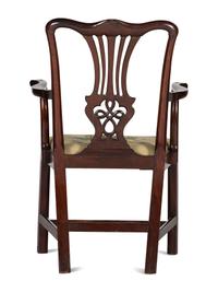 A Chippendale Carved and Figured Mahogany Armchair