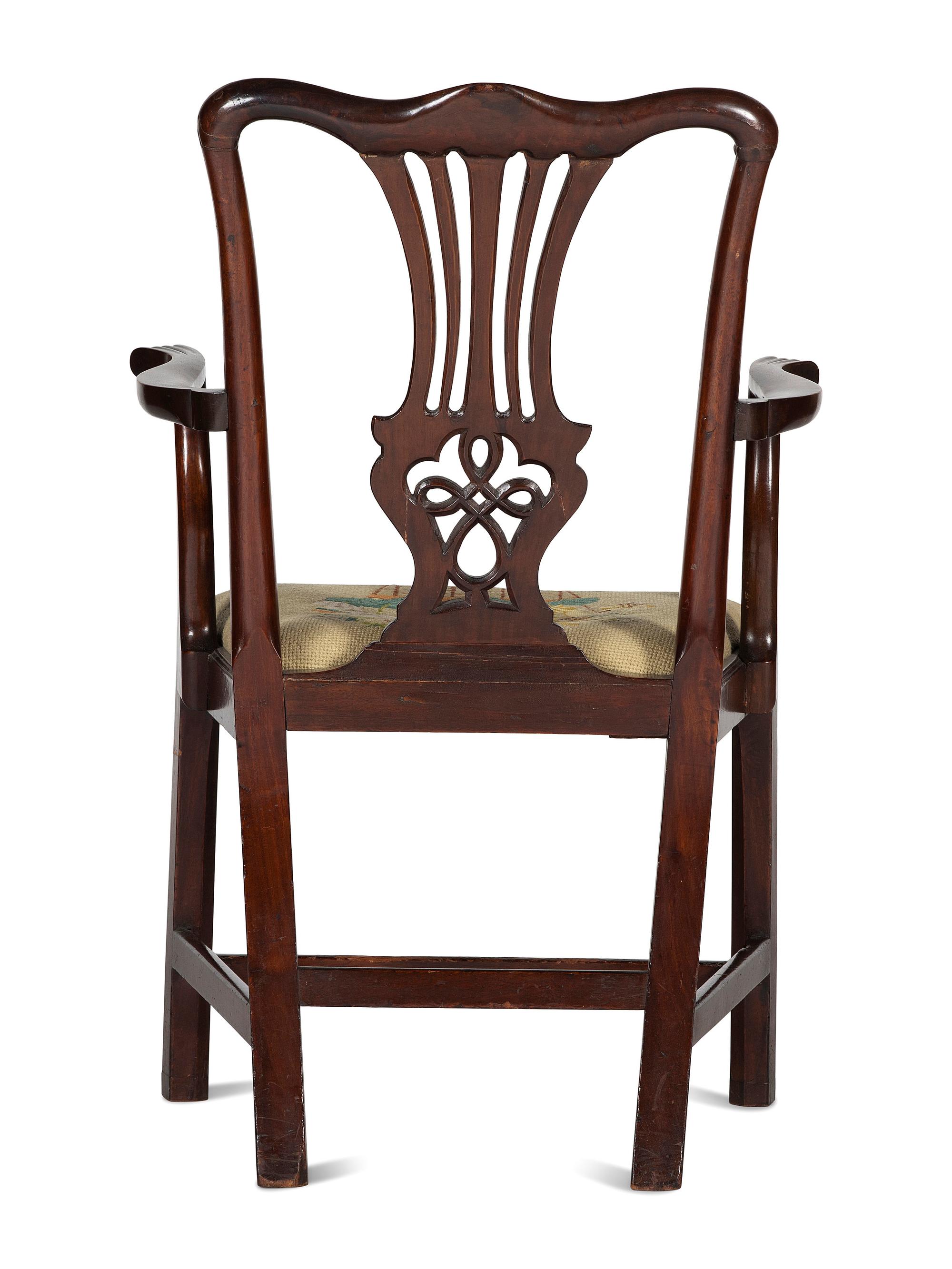 A Chippendale Carved and Figured Mahogany Armchair
