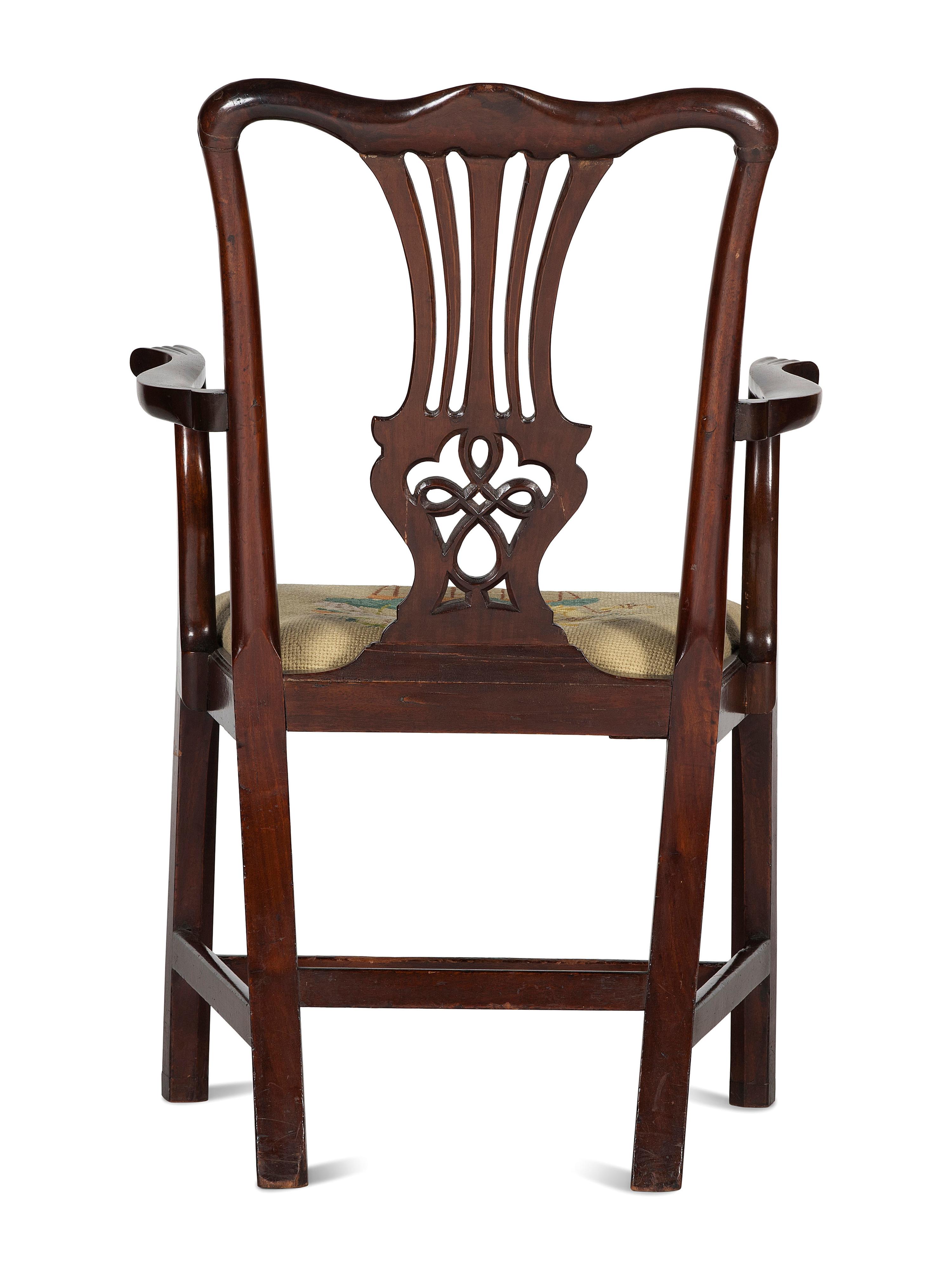 A Chippendale Carved and Figured Mahogany Armchair