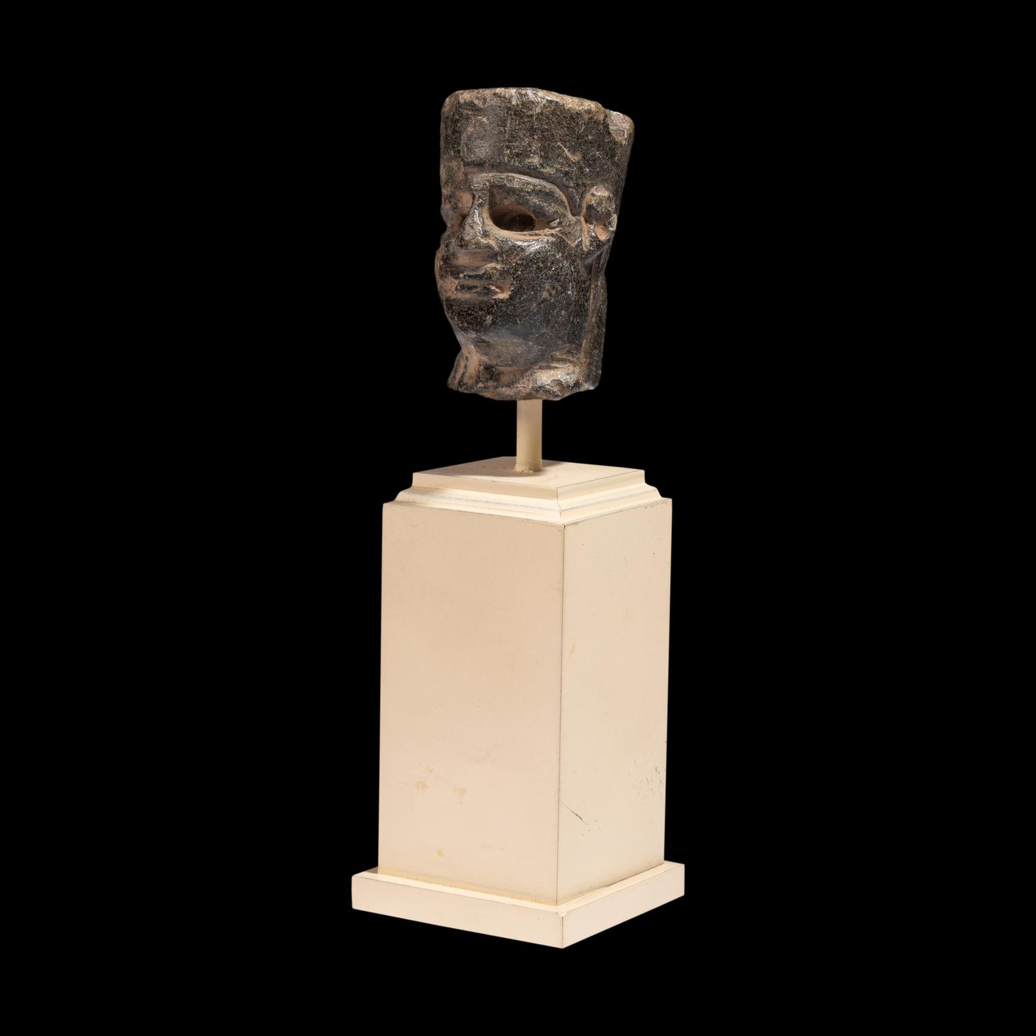 An Egyptian Stone Head of Amun