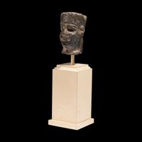 An Egyptian Stone Head of Amun
