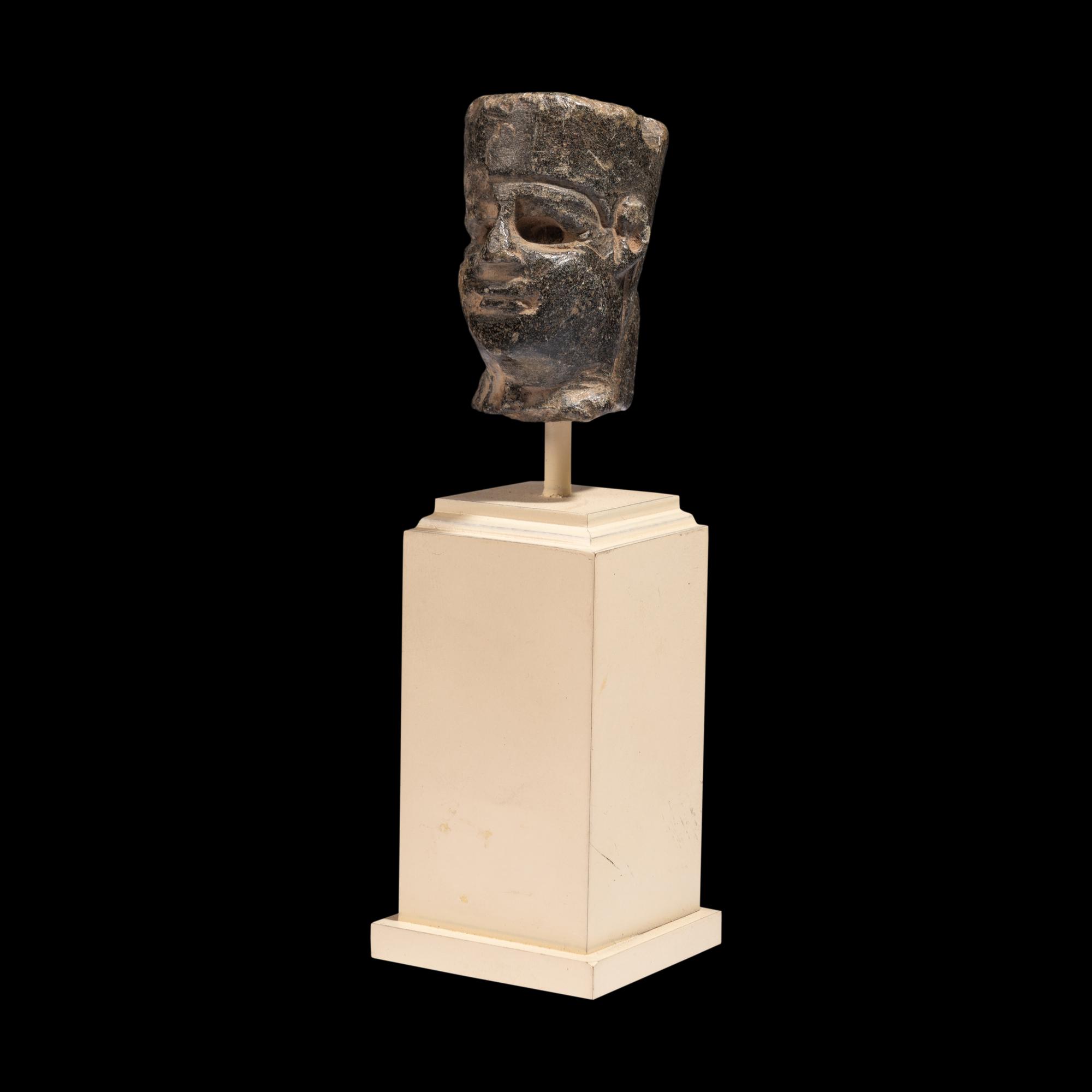 An Egyptian Stone Head of Amun