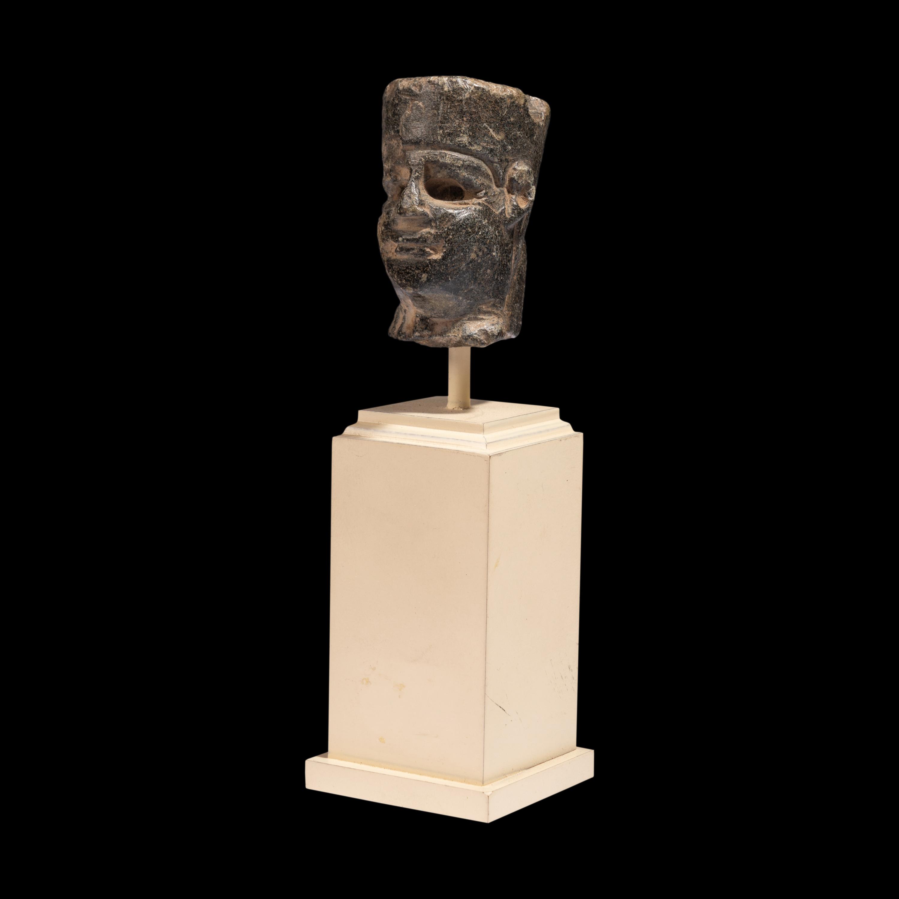 An Egyptian Stone Head of Amun