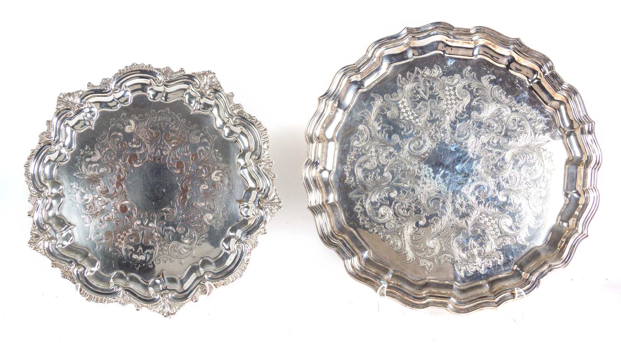 Eight Miscellaneous Silverplate Serving Trays Largest, length over handles 26 1/2 inches.