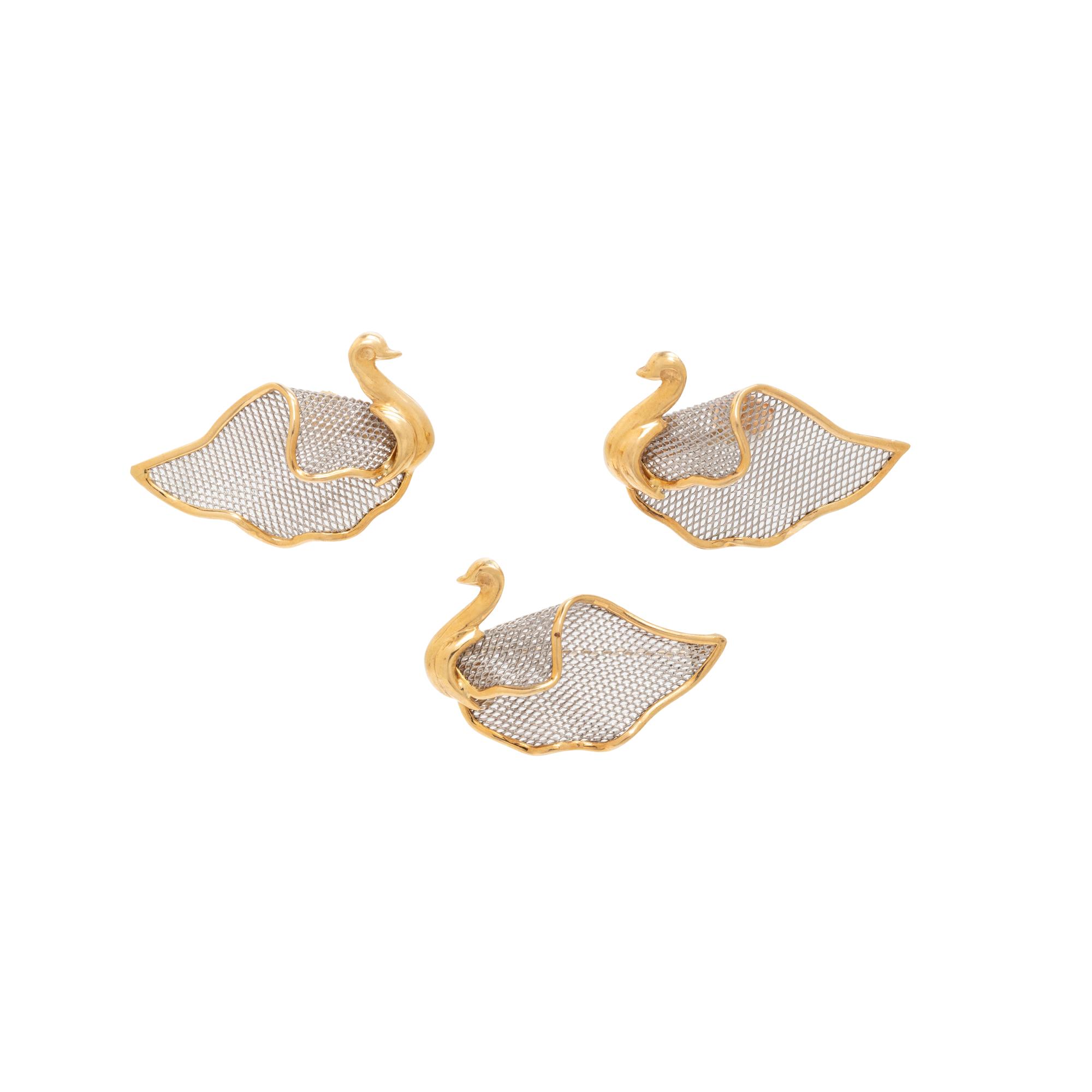 COLLECTION OF PLATINUM AND YELLOW GOLD SWAN JEWELRY