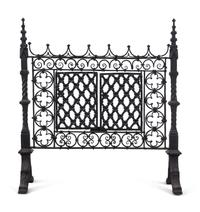 A Gothic Style Black Painted Wrought and Cast Iron Fire Screen