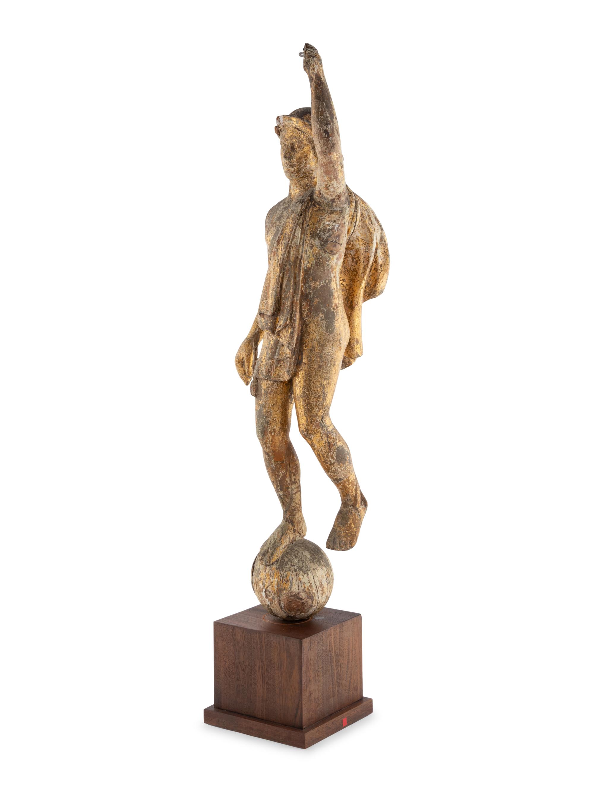 A Carved and Parcel Gilt Figure of Mercury