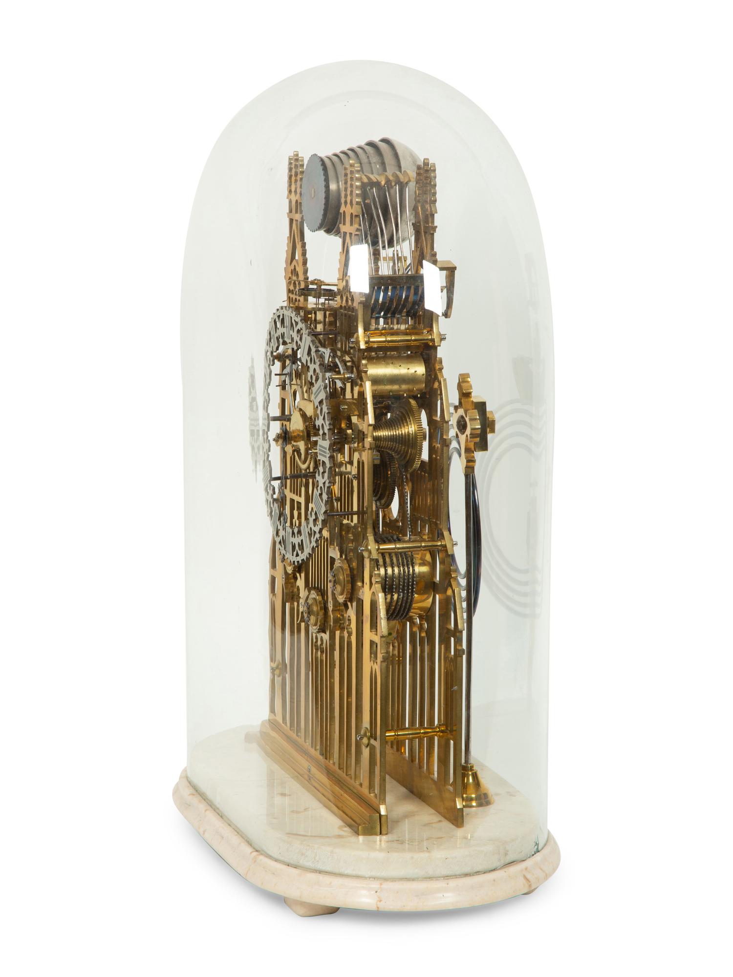 An English Gothic Revival Brass Musical Skeleton Clock