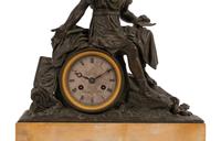 An Empire Style Patinated Bronze and Marble Figural Mantel Clock