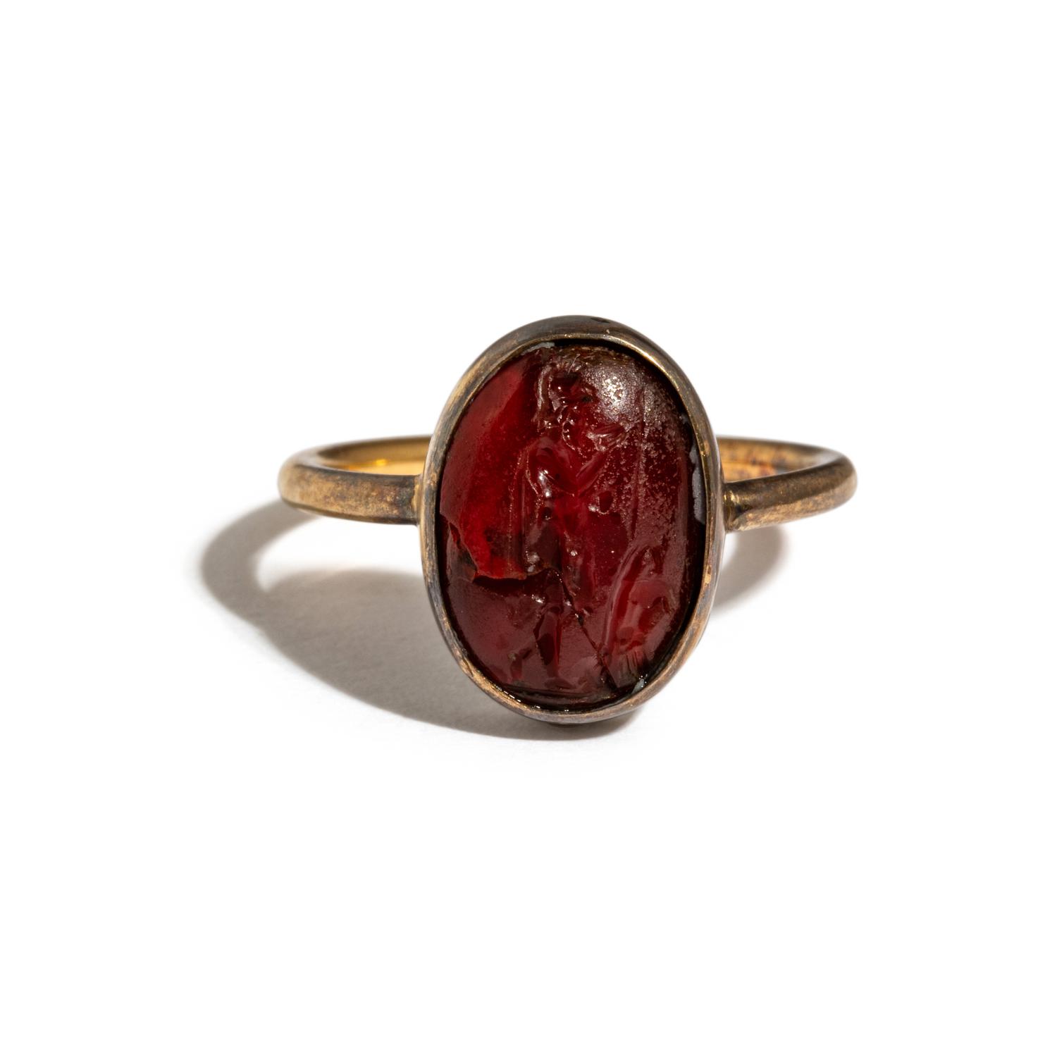 A Neoclassical Gold and Garnet Finger Ring with the God Mars