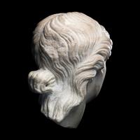 A Roman Marble Head of a Goddess or Youthful God