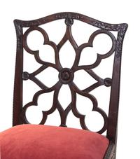 A Set of Four George III Mahogany “Gothick” Dining Chairs