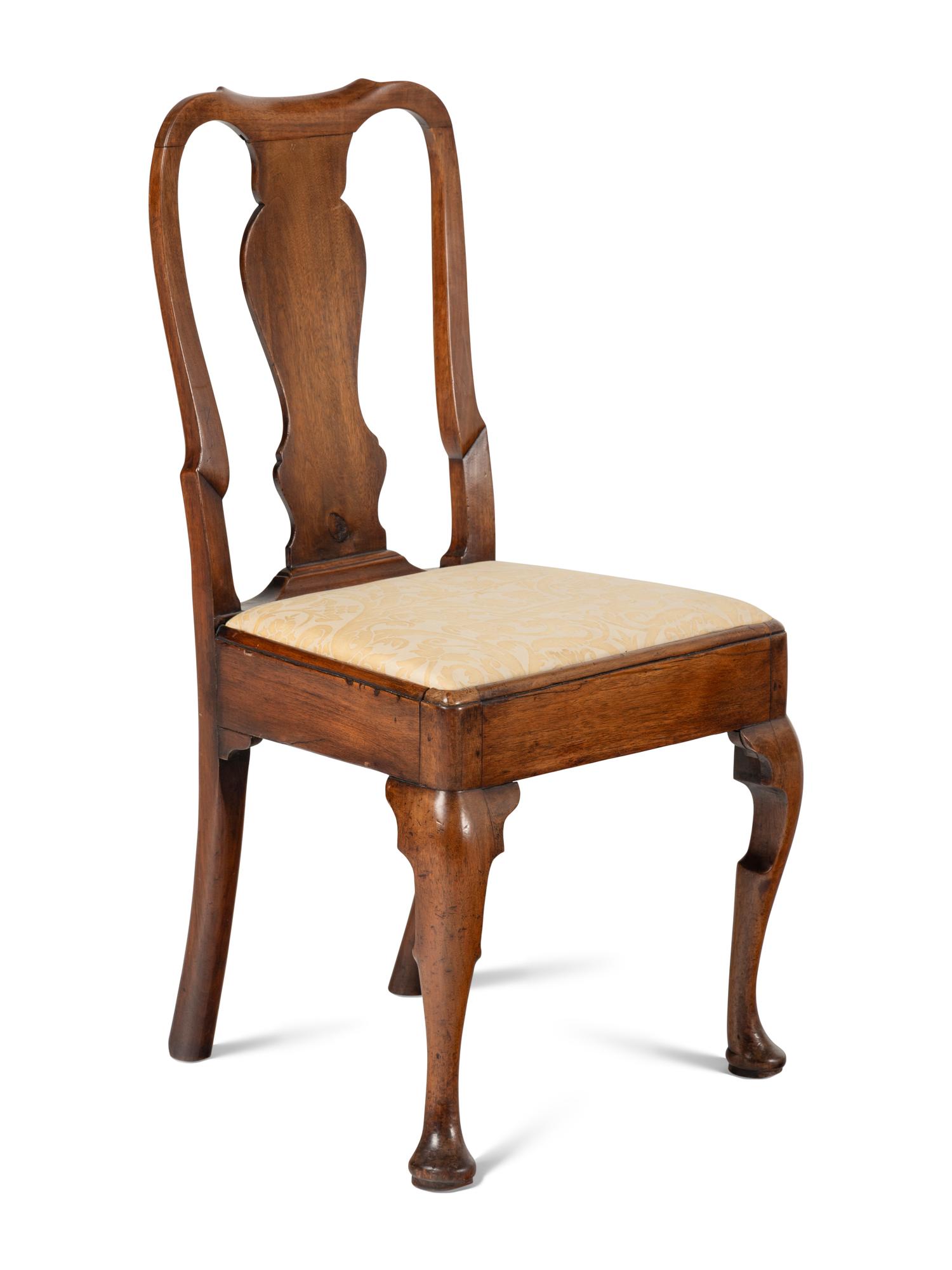 A Set of Three Queen Anne Walnut Side Chairs