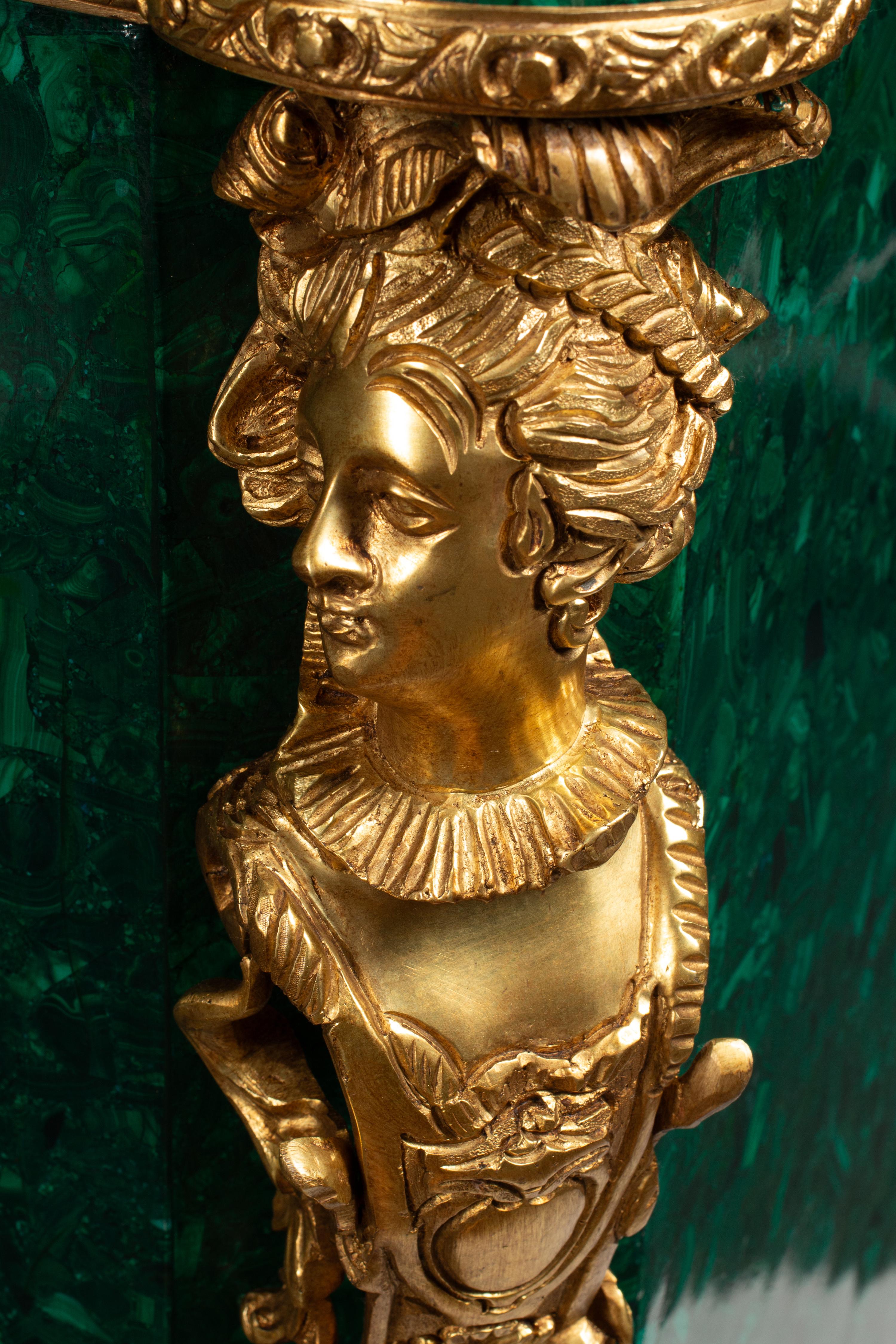 A Pair of Louis XVI Style Gilt Bronze Mounted and Malachite Veneered Cabinets