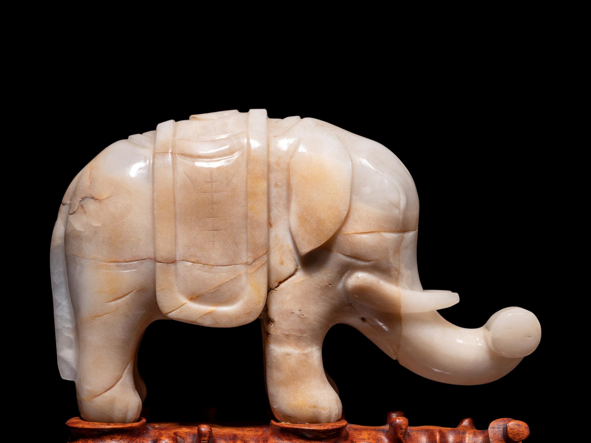A Pair of Chinese Carved Hardstone Figures of Elephants