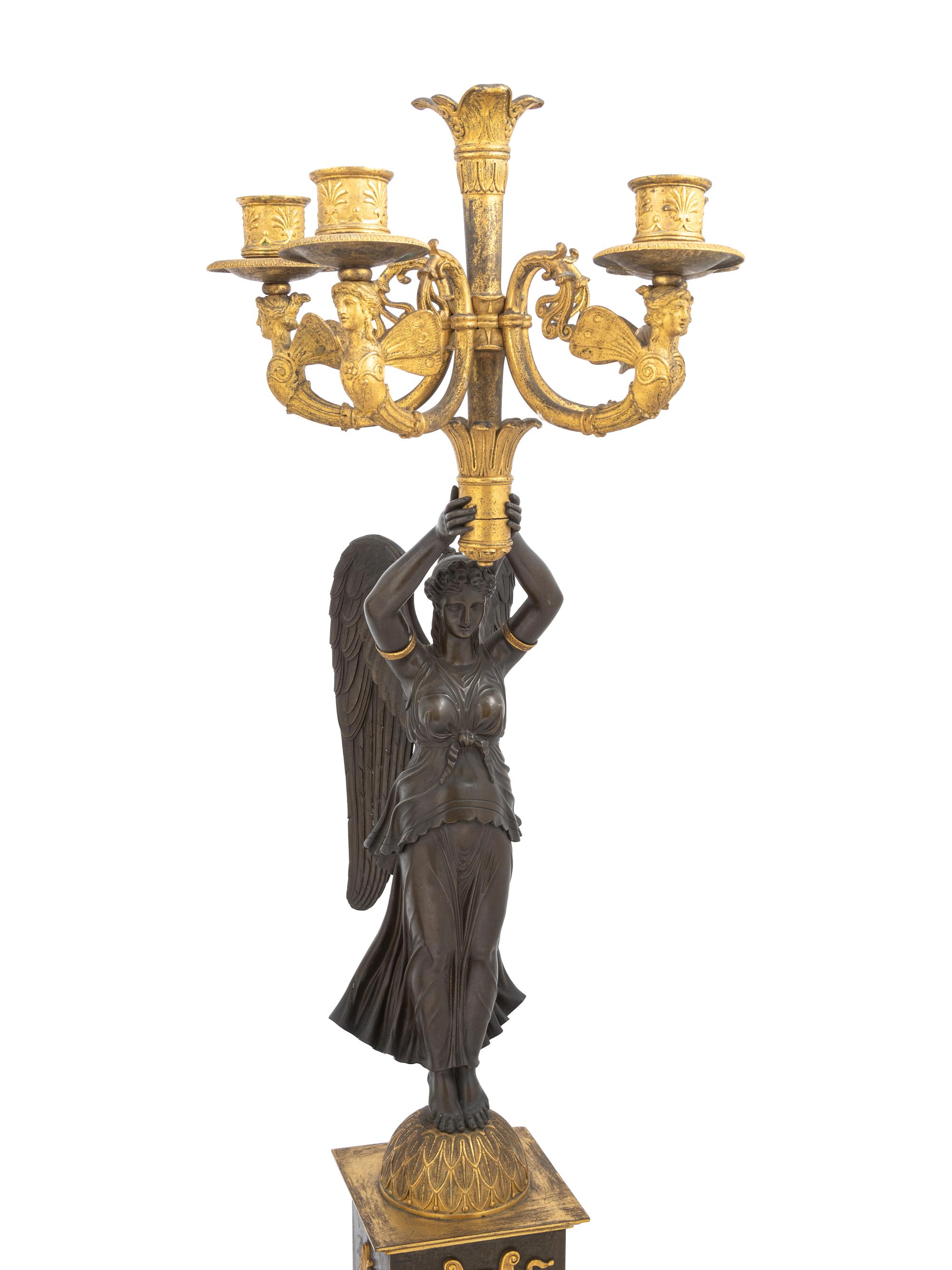 A Pair of Empire Ormolu and Patinated Bronze Figural Five-Light Candelabra