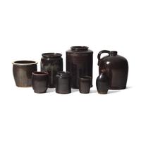 A Group of Eight Albany Glazed Redware Items