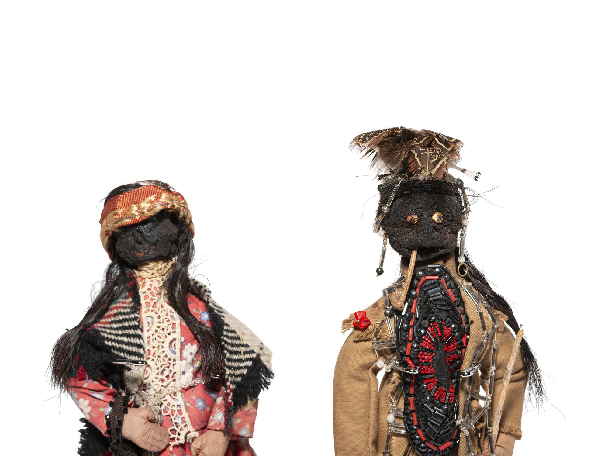 Pair of Applehead Dolls
