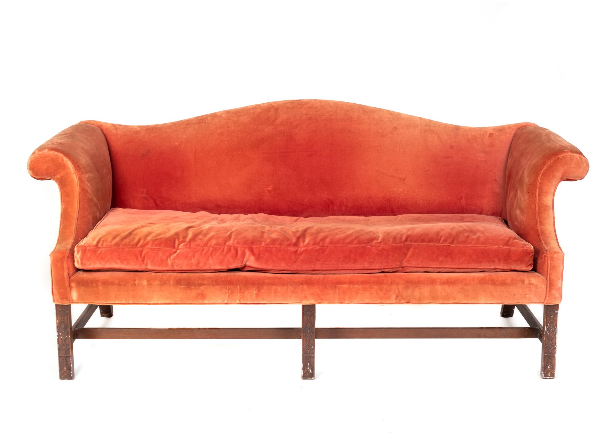 A George II Style Carved Mahogany Camel Back Sofa