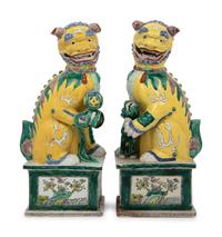 A Large Pair of Chinese Famille Jaune Porcelain Figures of Fu Lions