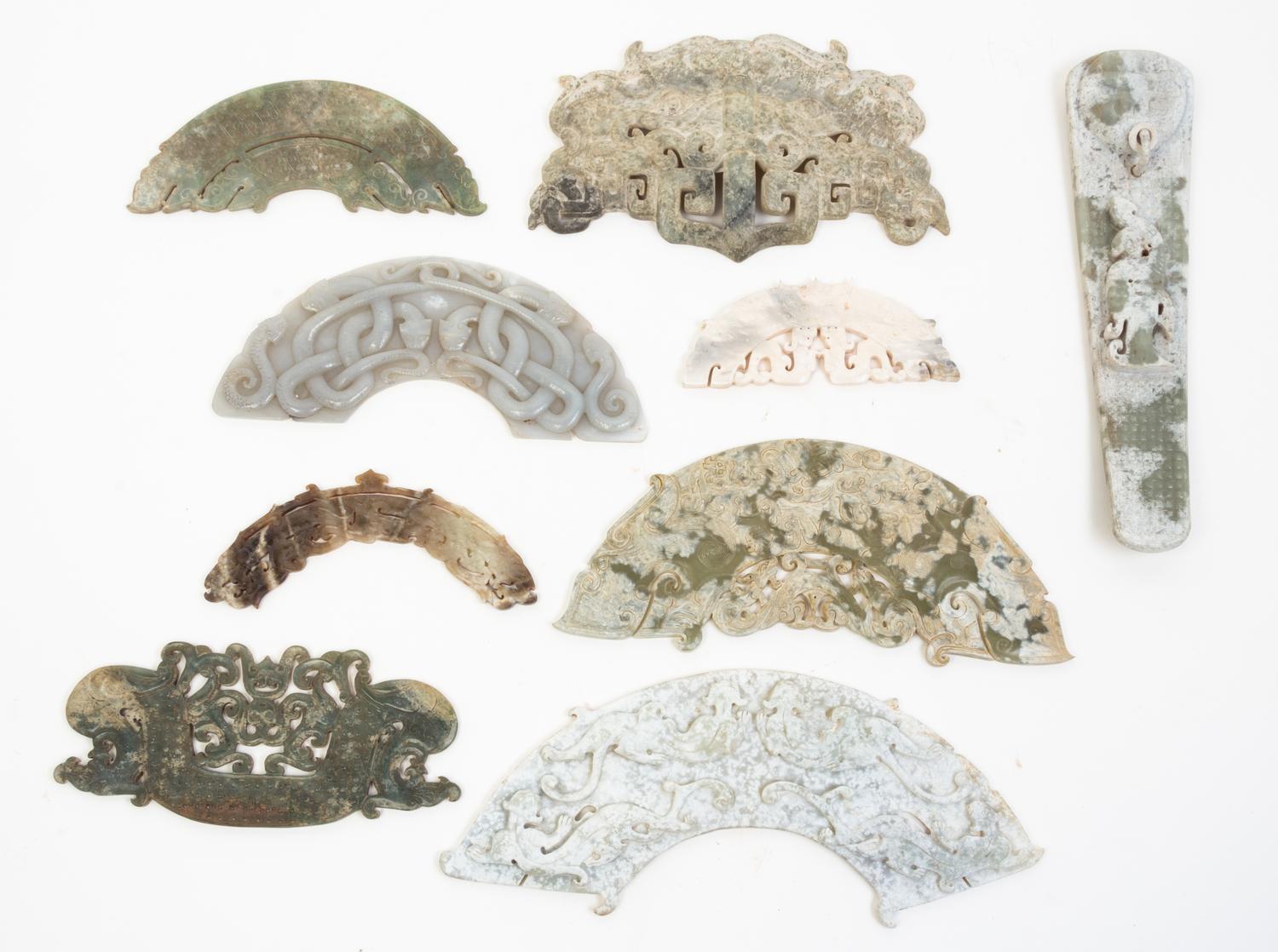 A Group of Nine Archaic Jade Plaques Length of largest 12 inches.