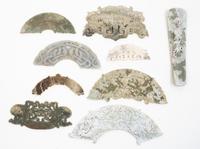 A Group of Nine Archaic Jade Plaques Length of largest 12 inches.
