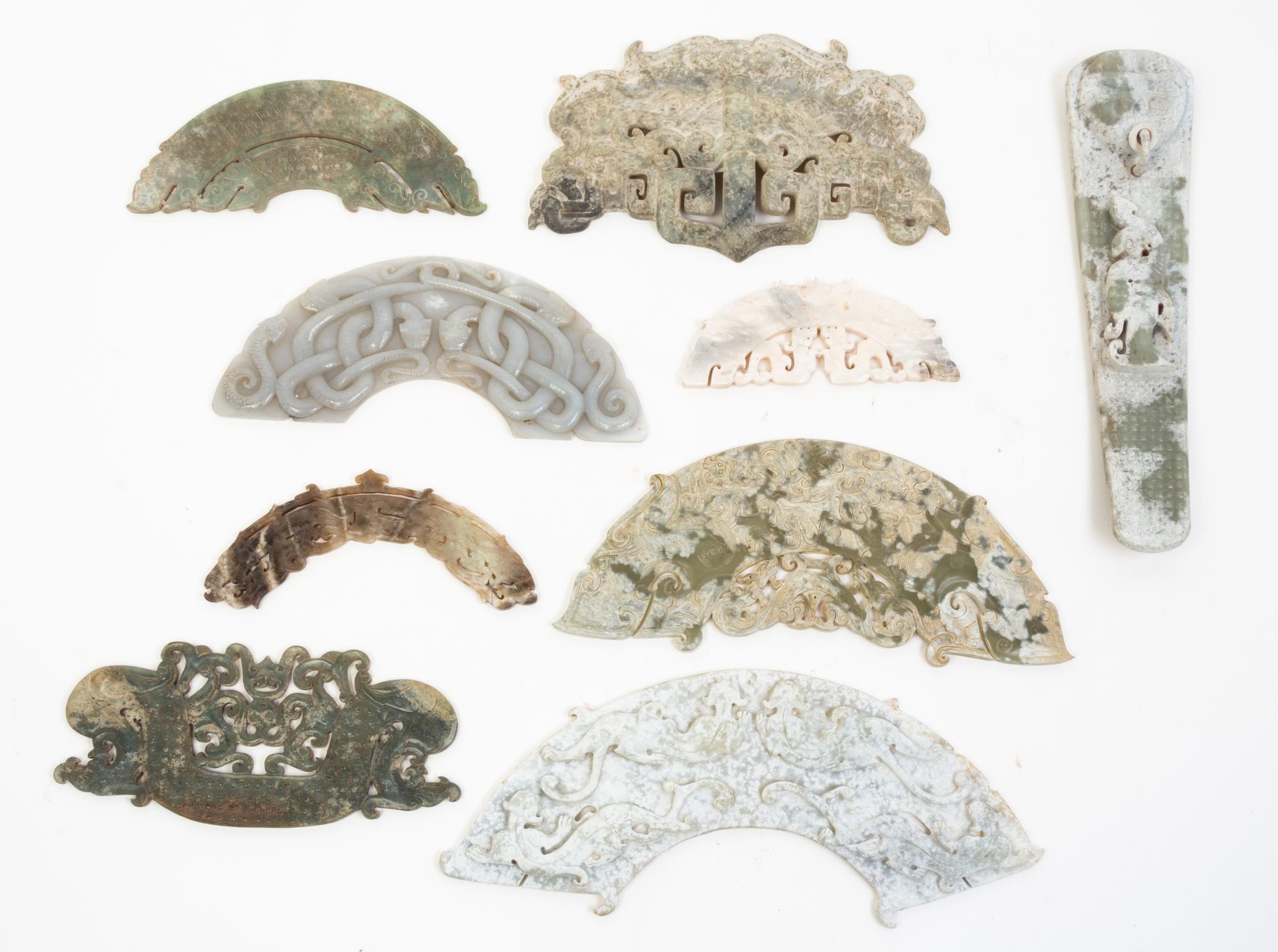 A Group of Nine Archaic Jade Plaques Length of largest 12 inches.