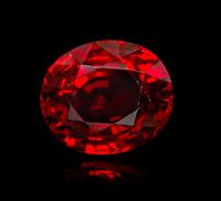 An 11.58 Carat Oval Mixed Cut Burmese Red Spinel, 4.30 dwts. (with setting)