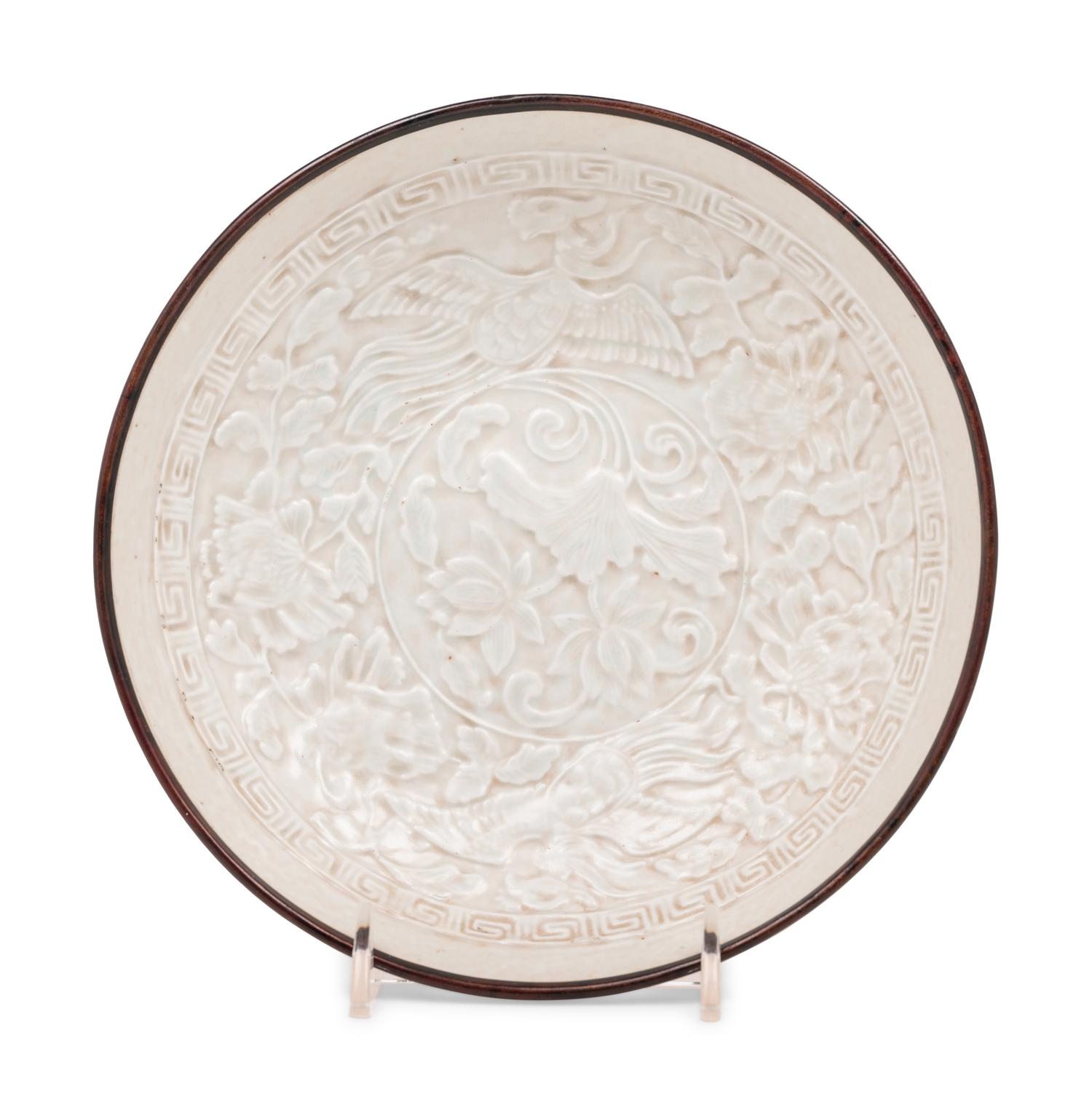 A Chinese Dingyao Style White Glazed Molded Porcelain Bowl