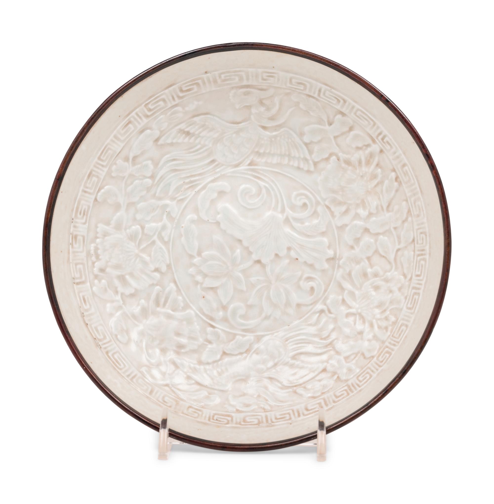 A Chinese Dingyao Style White Glazed Molded Porcelain Bowl