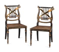 A Pair of Classical Gilt and Black Painted Lyre-Back Cane Upholstered Side Chairs