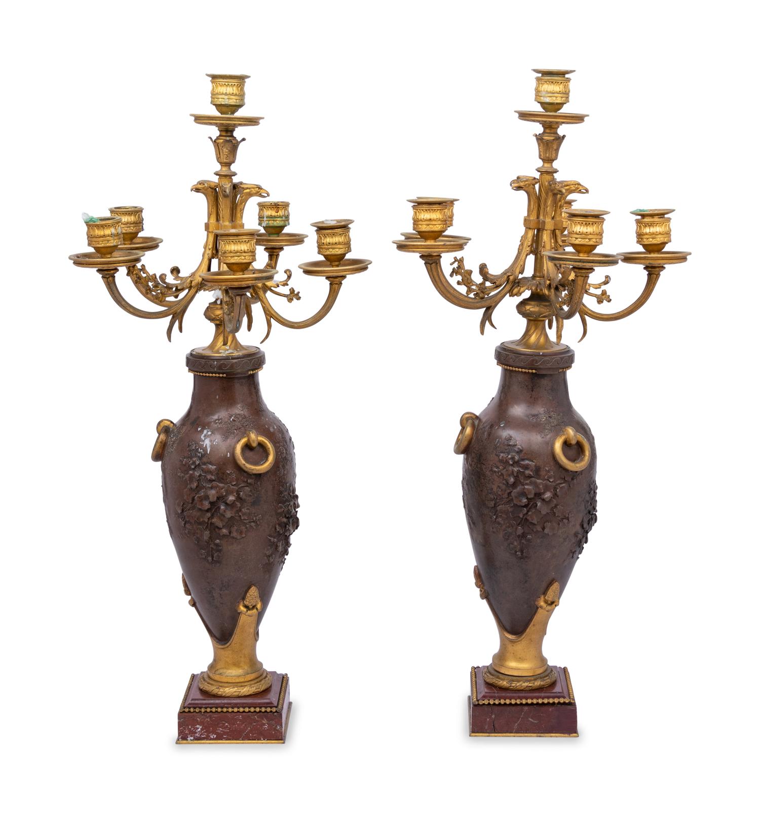 A Pair of Louis XVI Style Gilt and Patinated Bronze Six-Light Candelabra