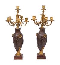A Pair of Louis XVI Style Gilt and Patinated Bronze Six-Light Candelabra