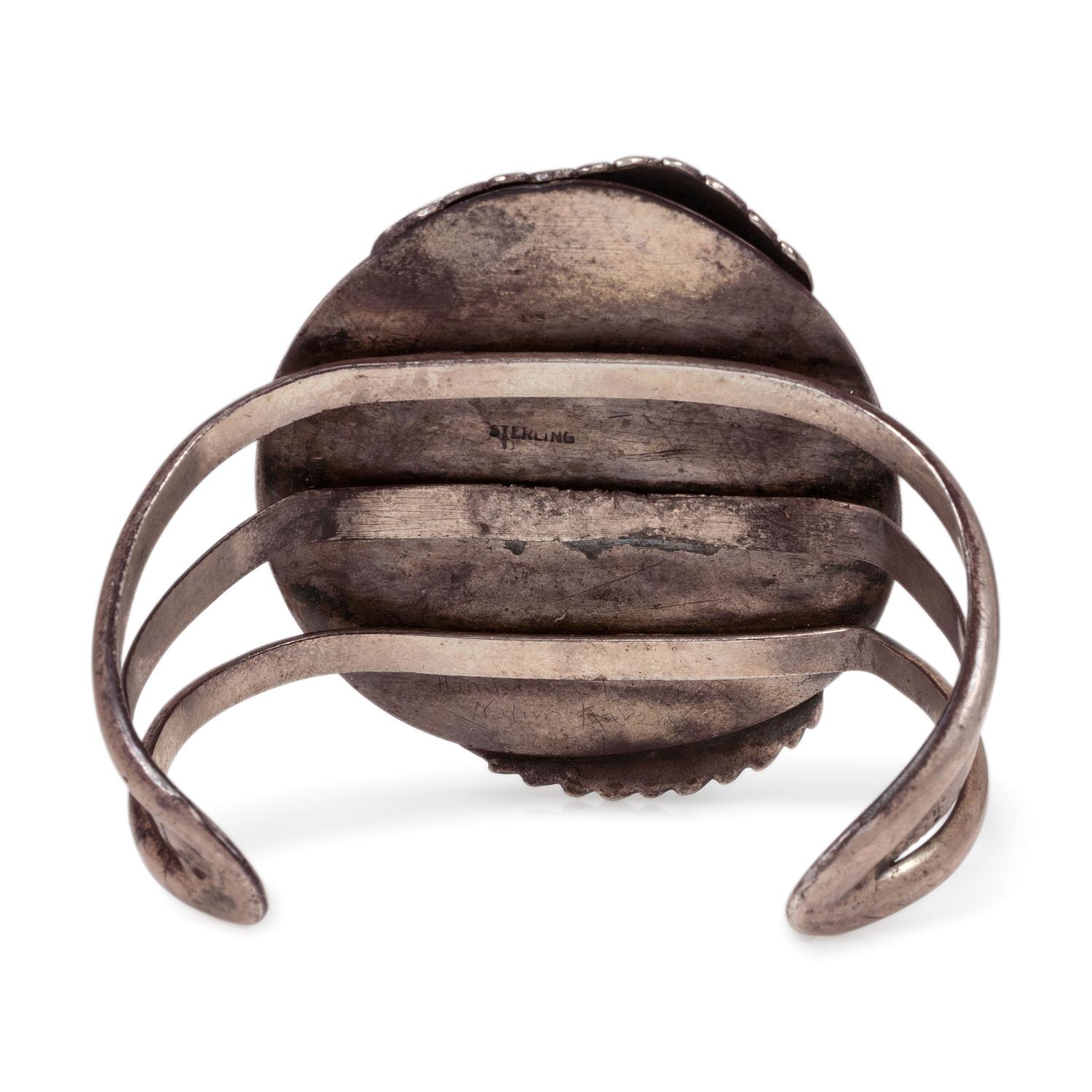 A Navajo Sterling Silver and Turquoise Cuff Bracelet, with Silver Leaf Applique