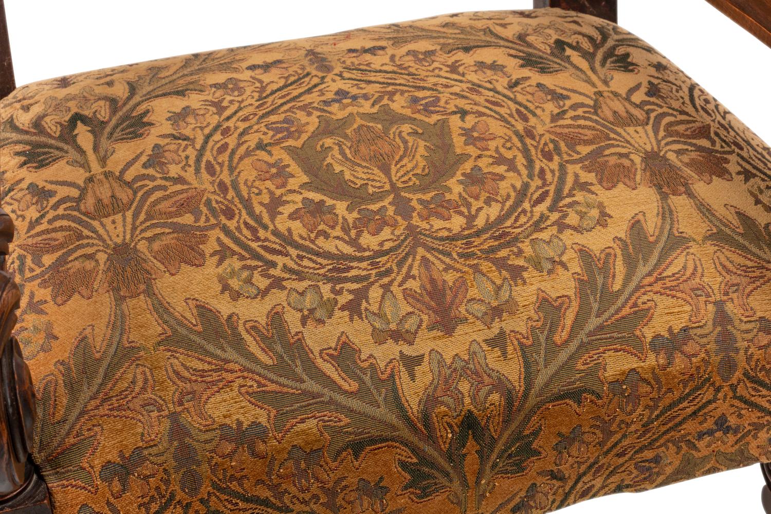 A Pair of Flemish Baroque Style Carved Walnut Armchairs