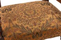 A Pair of Flemish Baroque Style Carved Walnut Armchairs